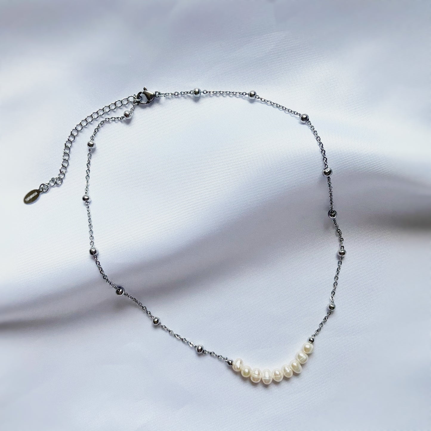 Composition Livy - Colliers argentés